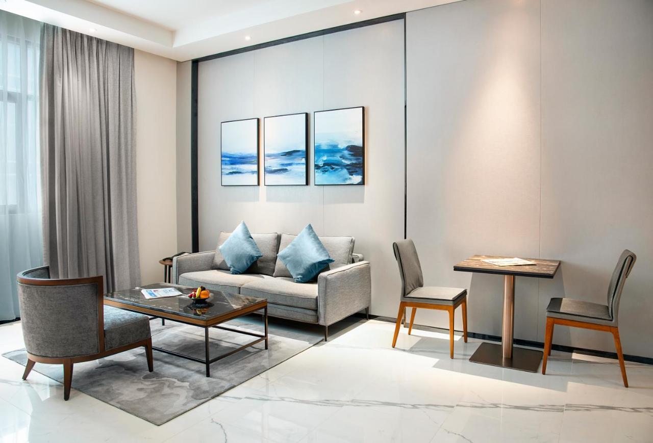Asiana Grand Hotel Дубай Екстериор снимка A living room at the hotel