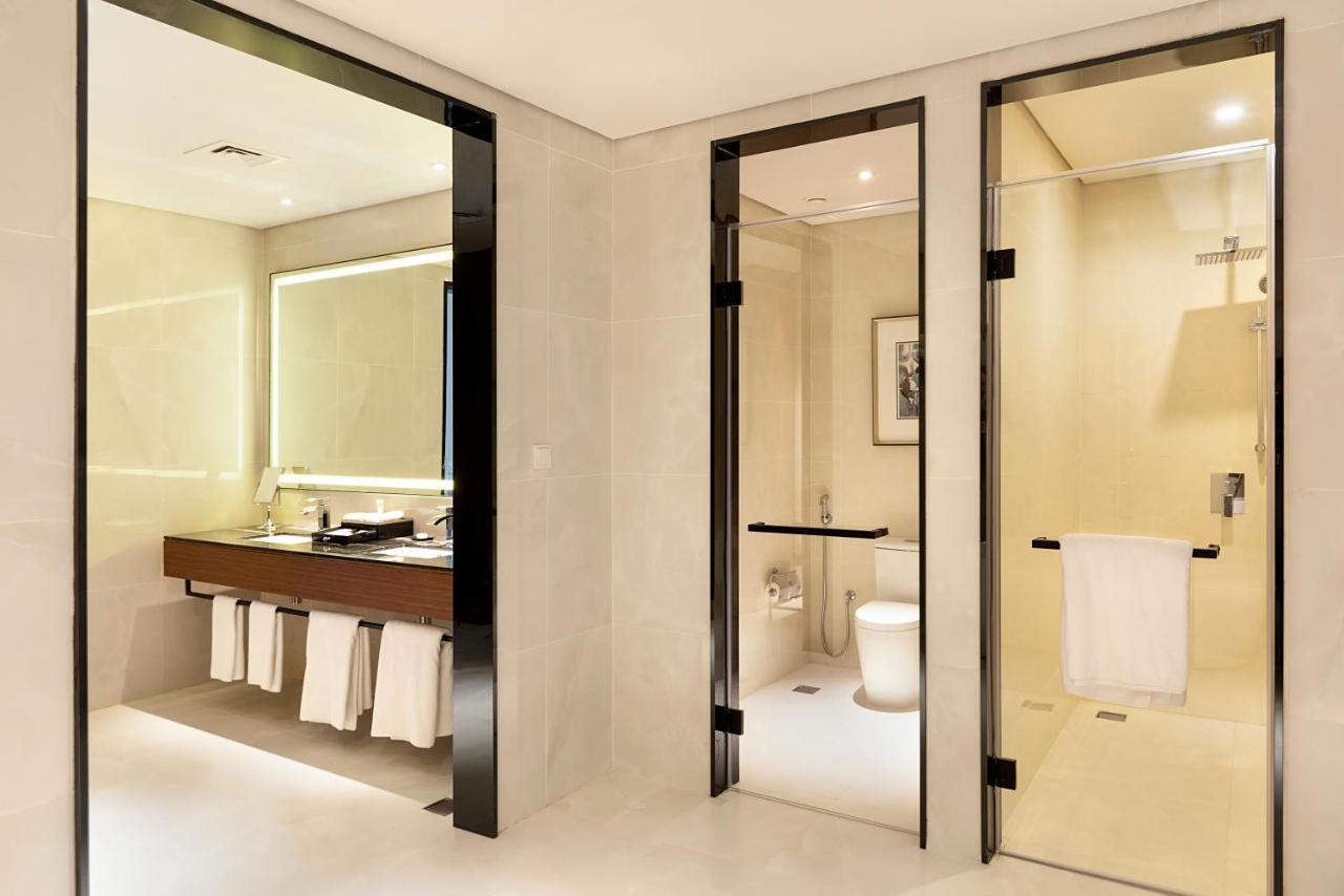 Asiana Grand Hotel Дубай Екстериор снимка A bathroom with a shower room