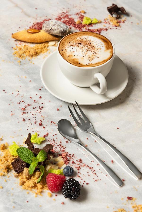 Asiana Grand Hotel Дубай Екстериор снимка A coffee cup with a saucer