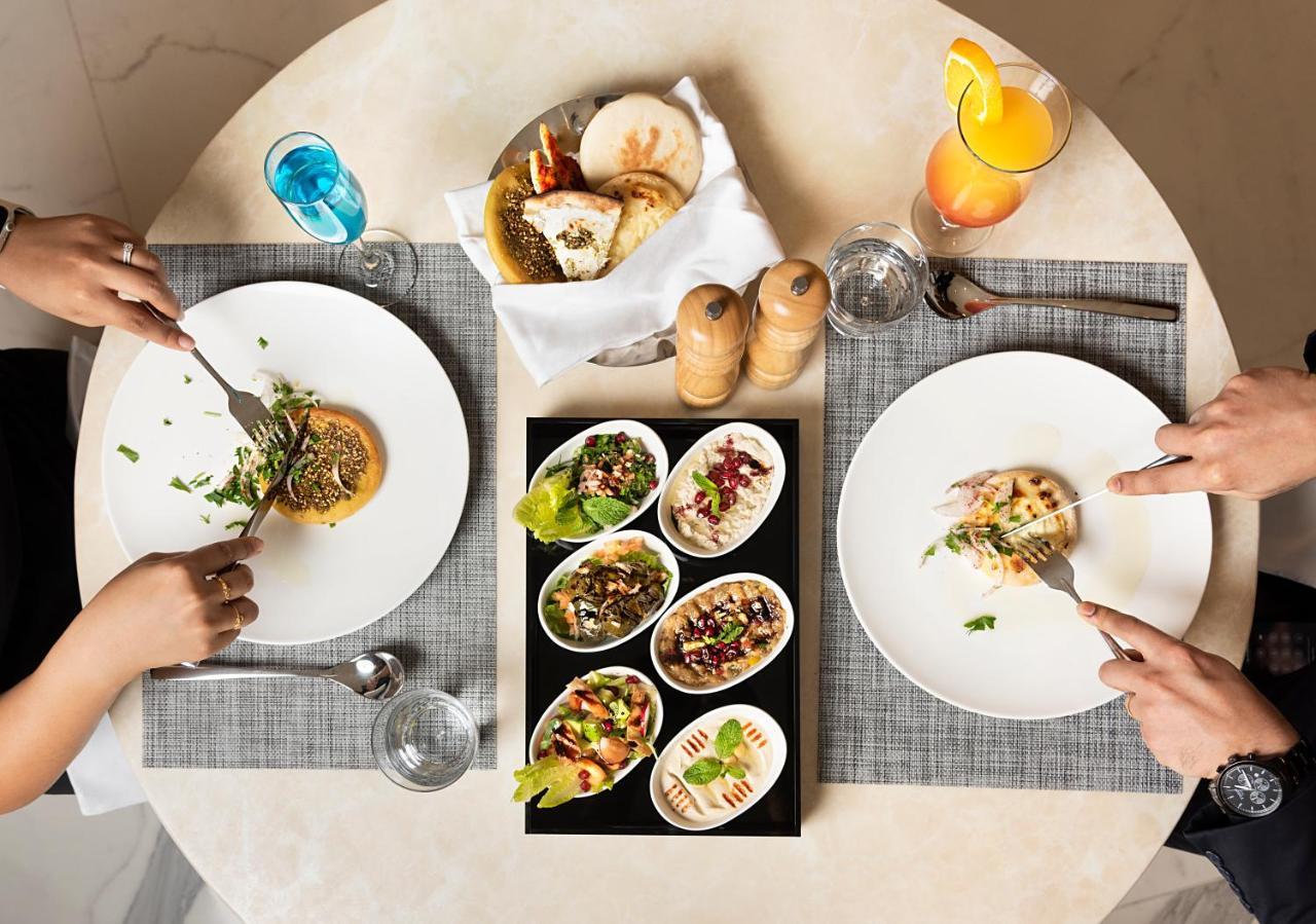 Asiana Grand Hotel Дубай Екстериор снимка A selection of meze
